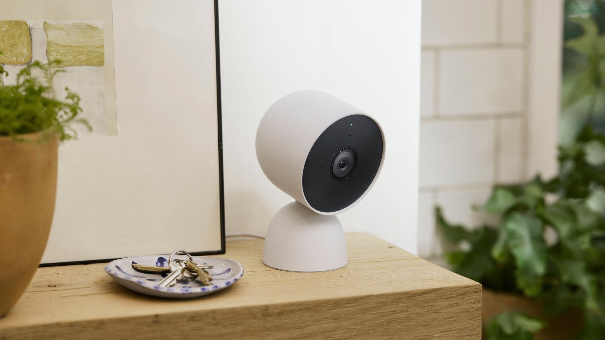 The Google Nest Cam placed on a shelf.